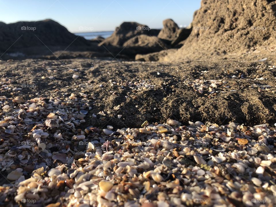 Beach rock sun mountain Morocco 