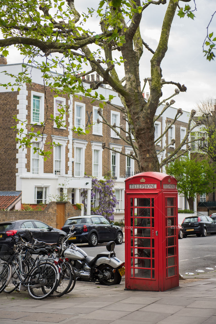 Red Phone booth in Camden town in London.