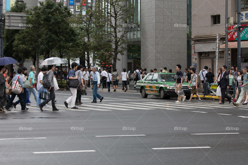 People crossing the road in Japan 