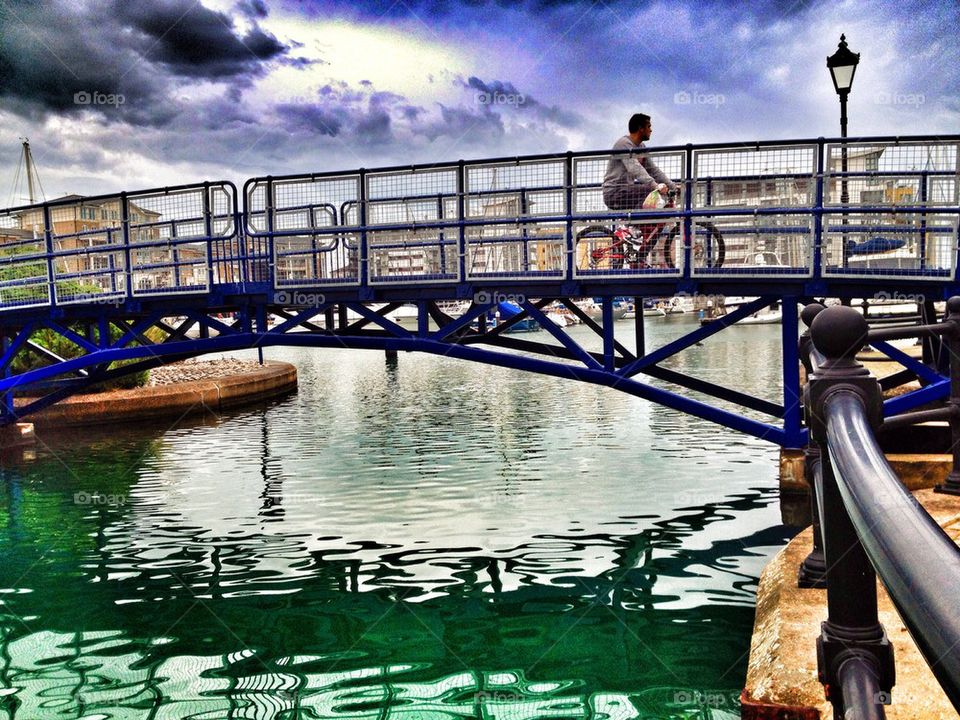 Cyclist on bridge