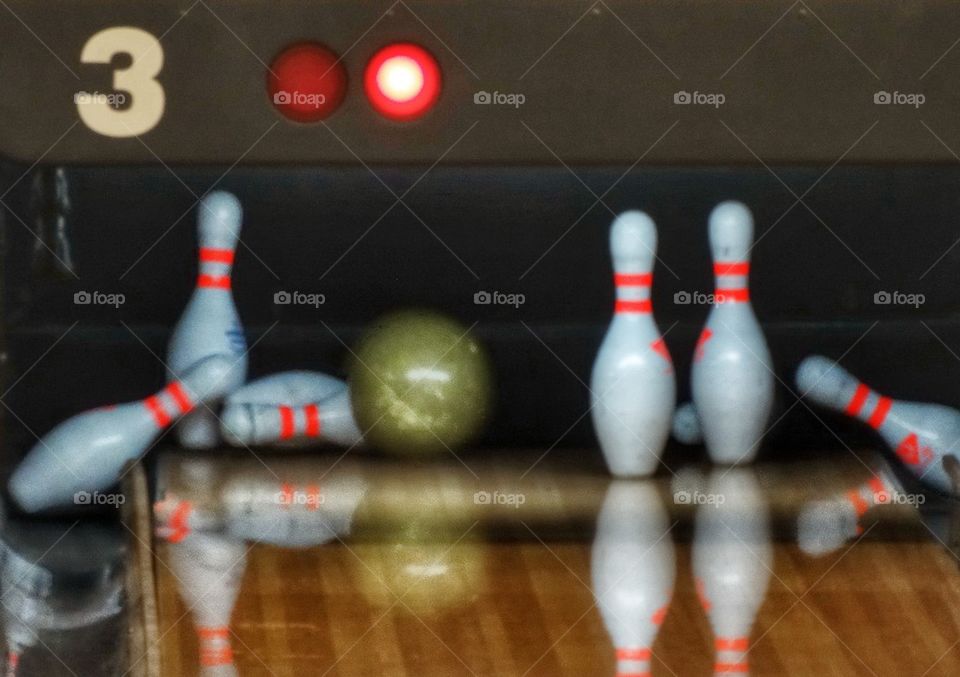 Bowling Ball Knocking Down Pins. Kinetic Energy On Display
