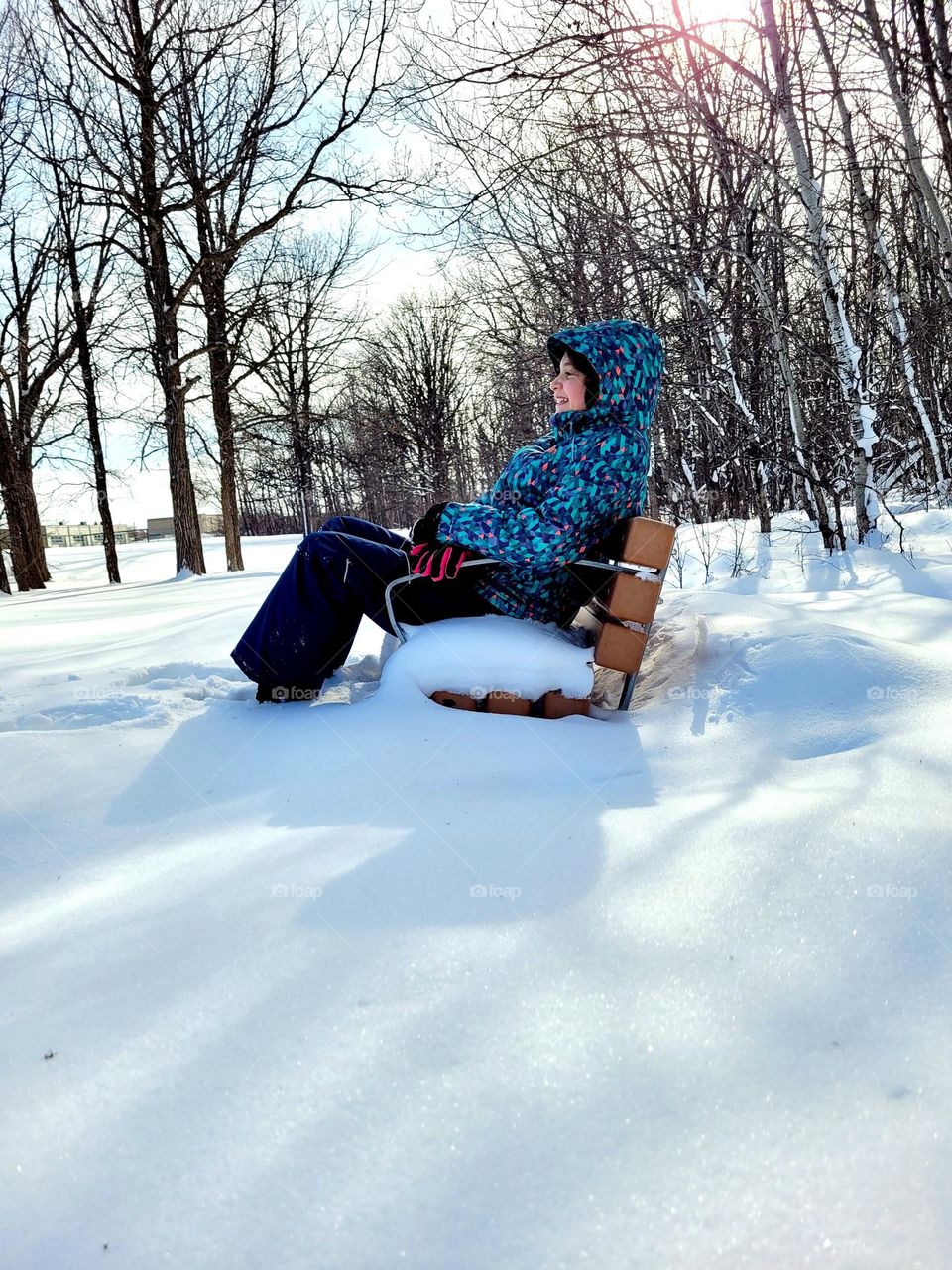 sitting on a bank full of snow