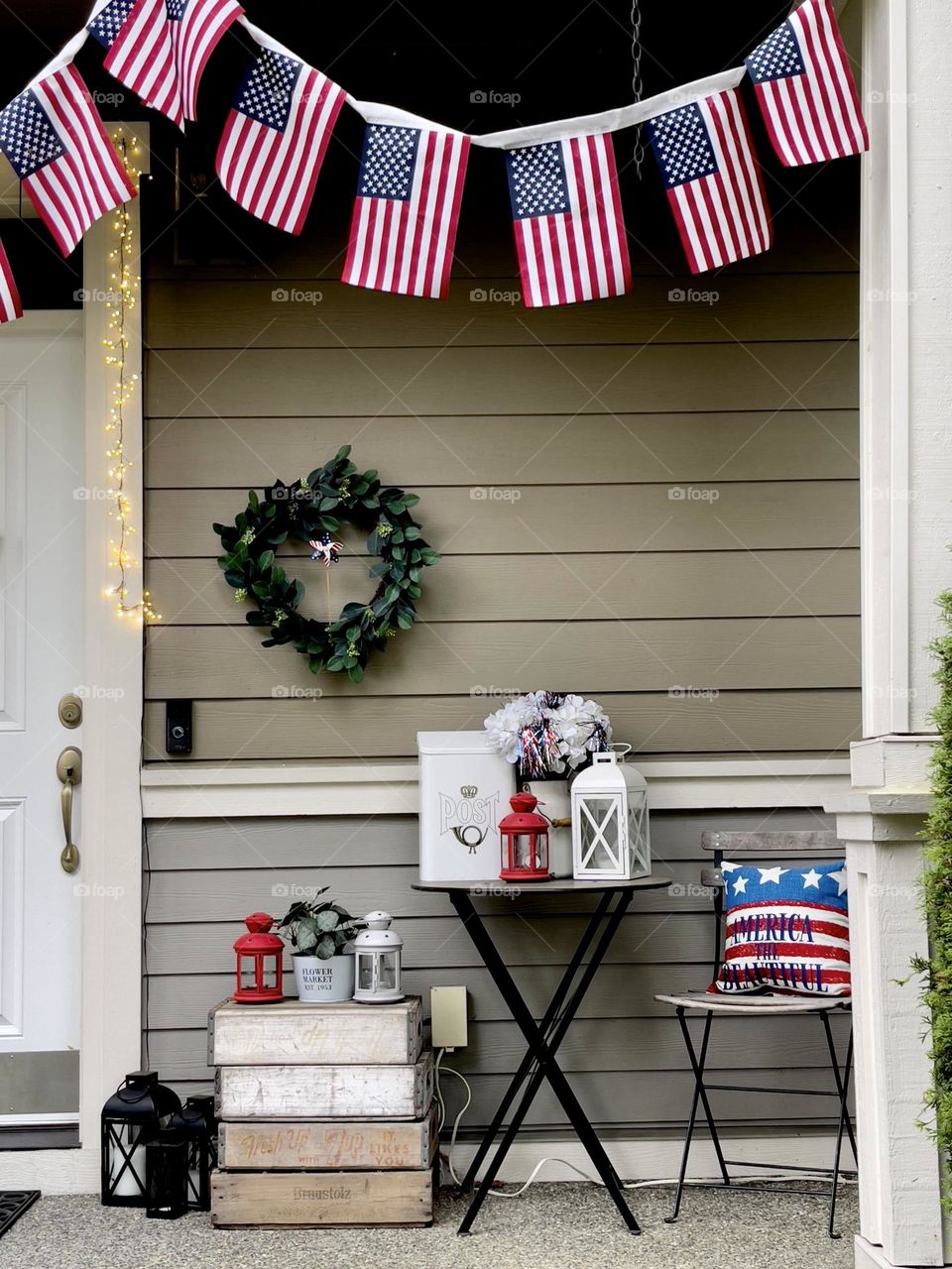 American house decorated with flags for 4th of July 