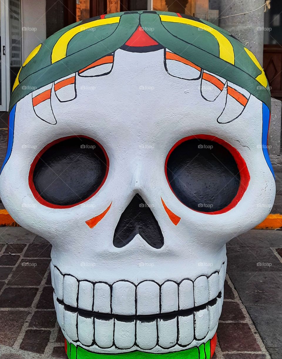Skull,tradition,México,colorful,day of the dead,nose,teeth,eye,White,green,Orange