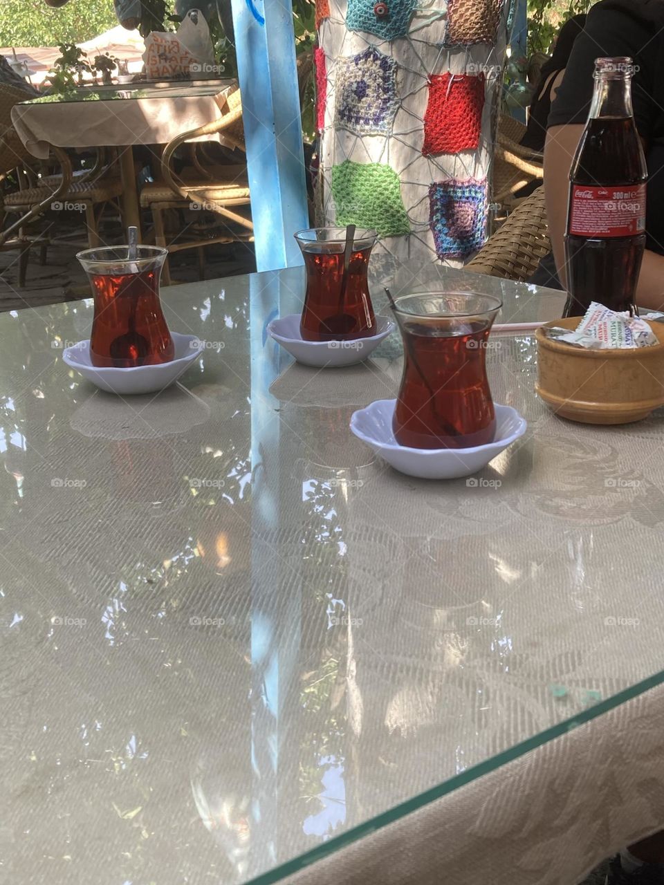 Greek village in Turkey. Blue sky and tall palm trees. Sunsets and sunny days. Summertime in Kusadasi. Vacation travel in Turkey . Summer view. Sunny day during vacation. Hidden gems and secret places.