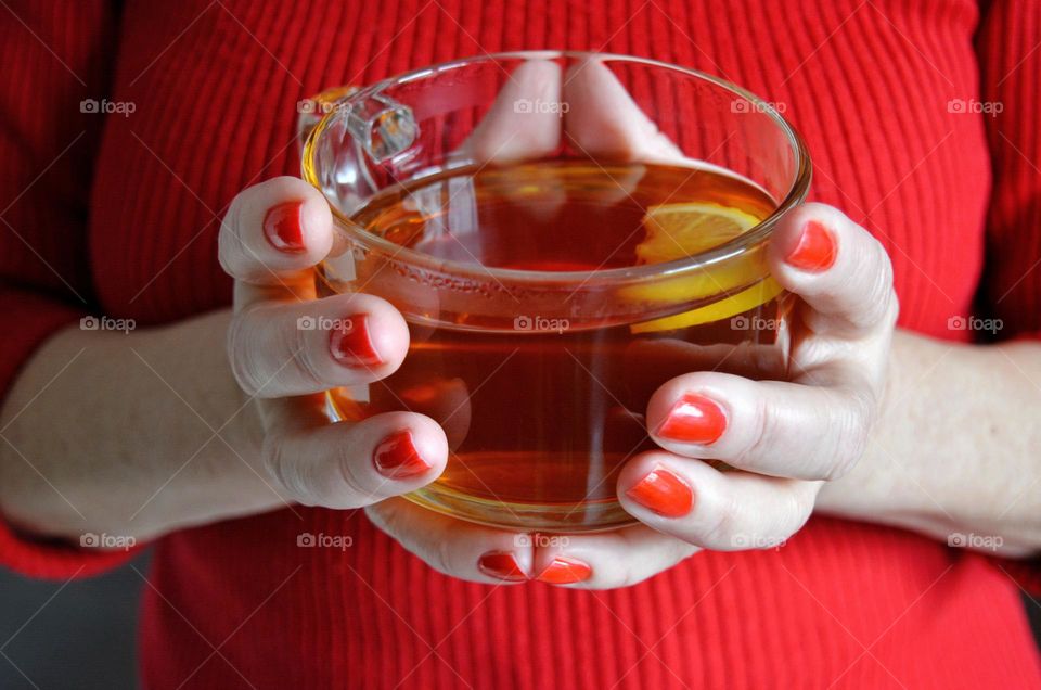 cup of tea in the hand, drinking tea, good morning