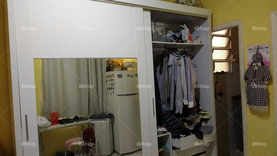 mess of clothes in the closet