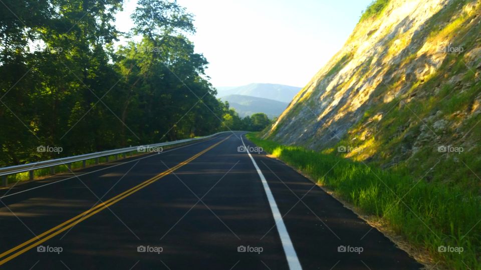 Rural road with a mountain backdrop