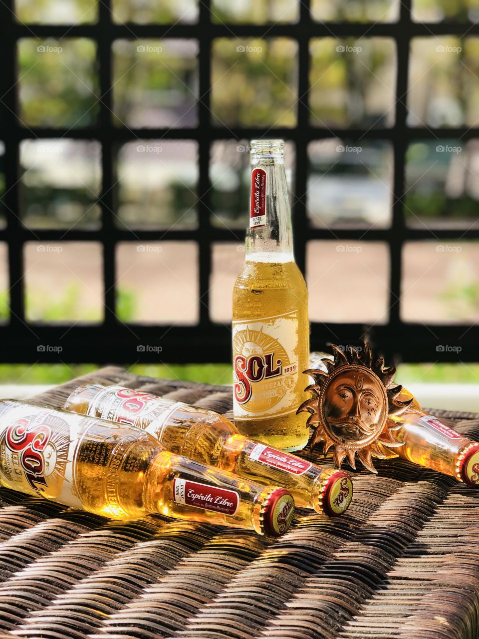 Enjoying with sol beer like anything With symbol of sun