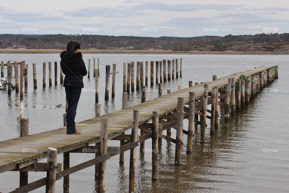 Girl on a pier