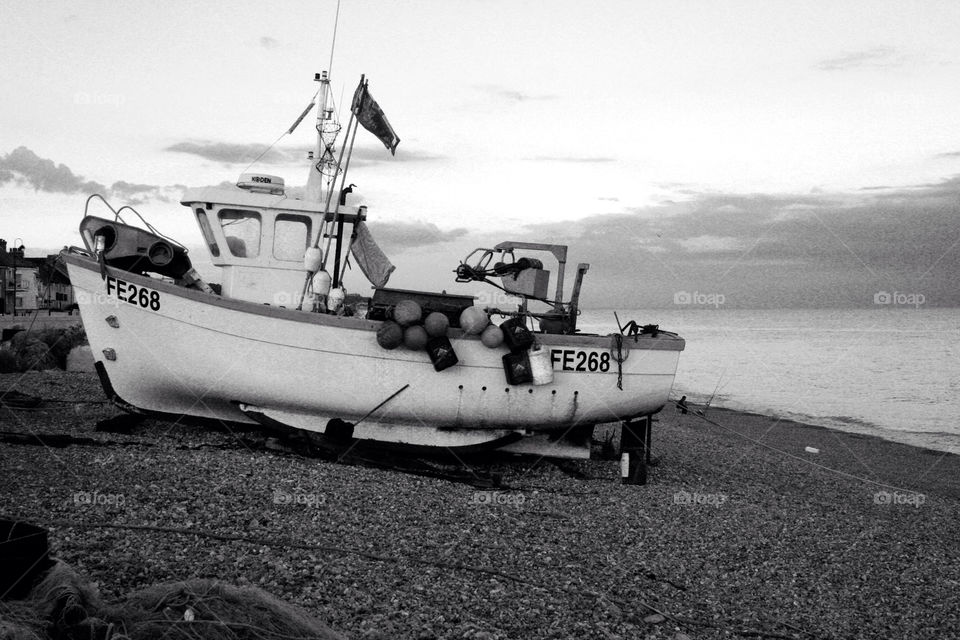 beach boat fishing pebble by dannytwotaps