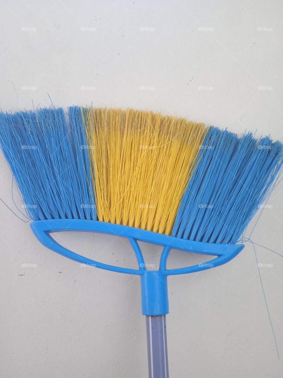 Broom head in white background