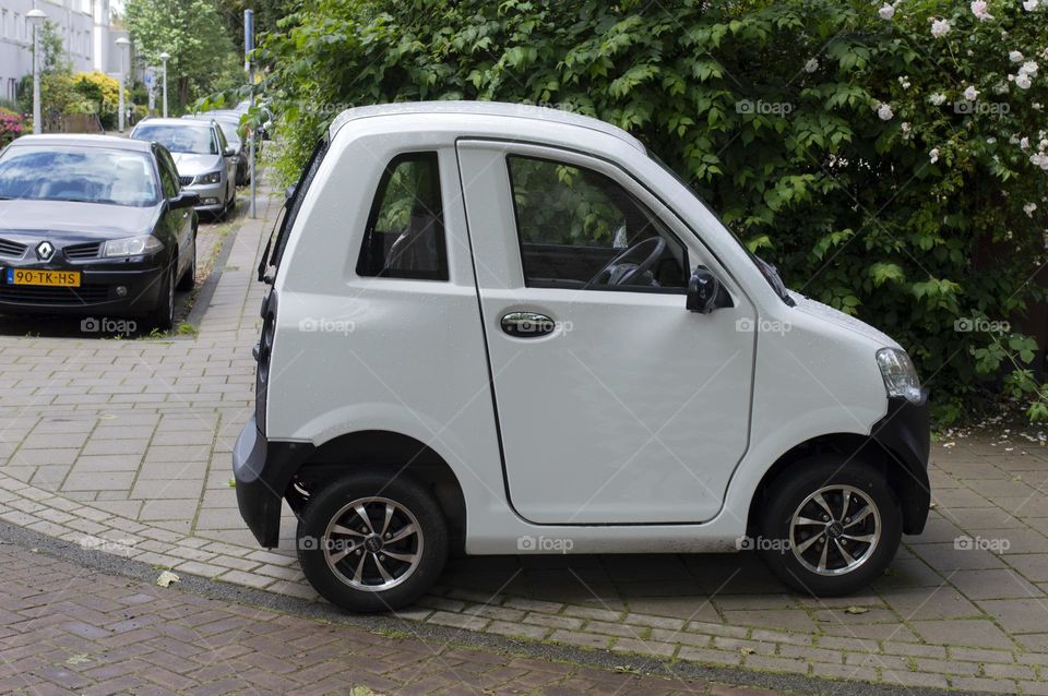A White Max Mobiel Mini Car At Amsterdam The Netherlands 10-2-24