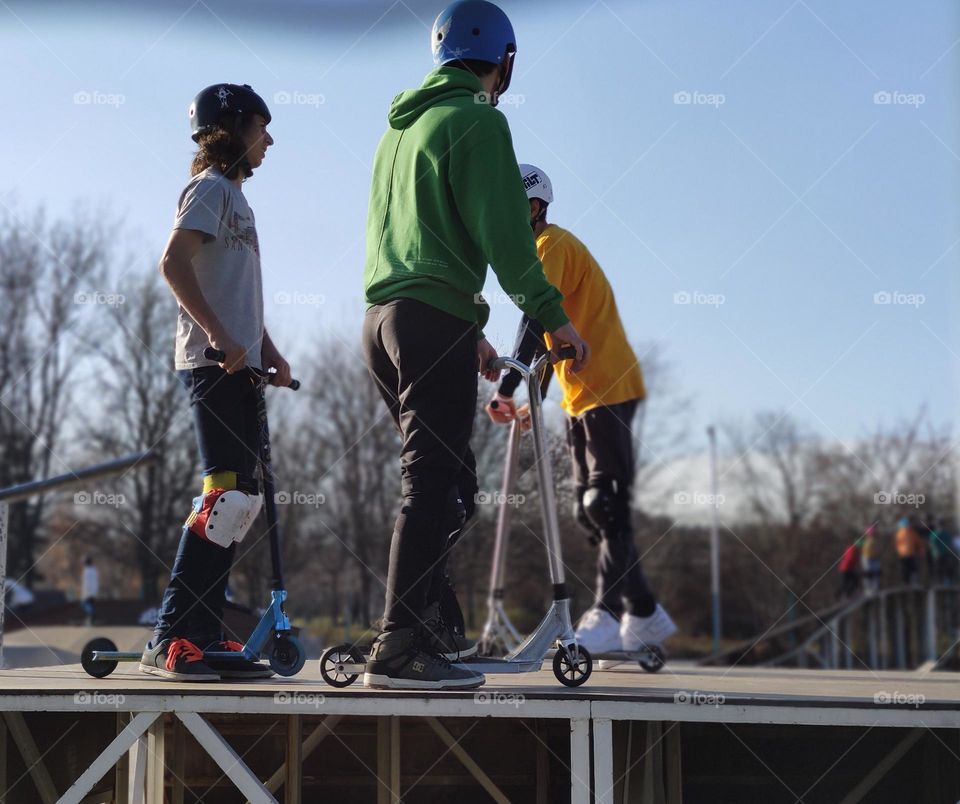 Play with scooters and friends outside