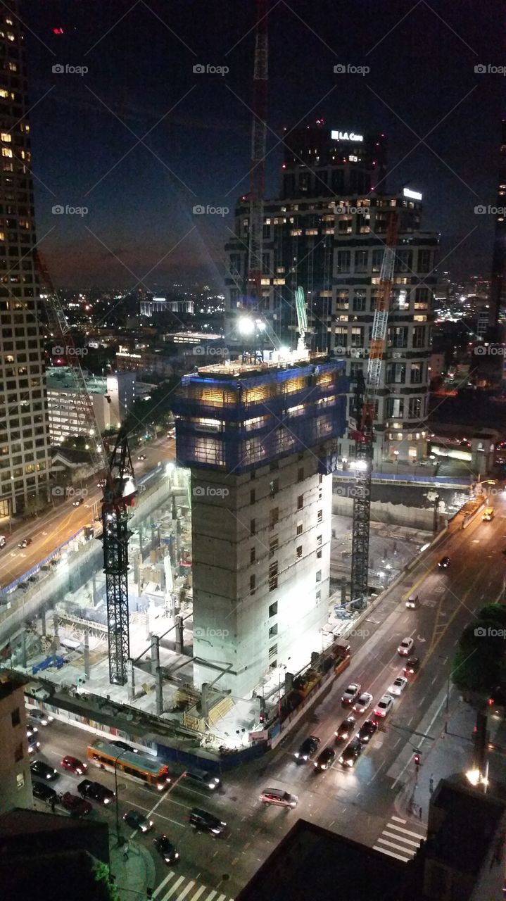 Los Angeles high rise building under construction at night