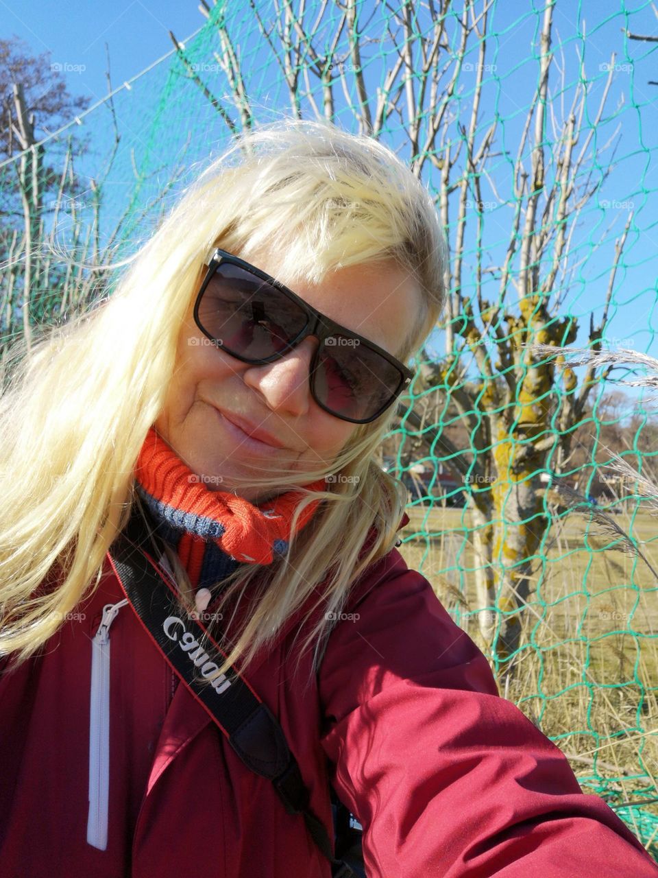 my self . Woman in hikes. Love hiking and Nature . with sunglasses . a spring day .