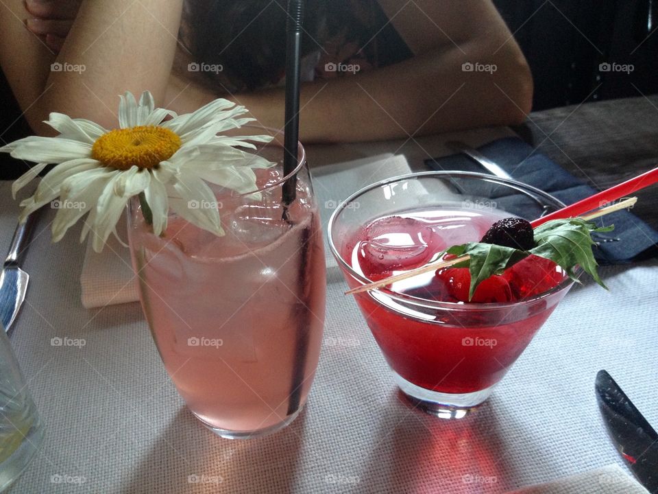 Two cocktails on a table