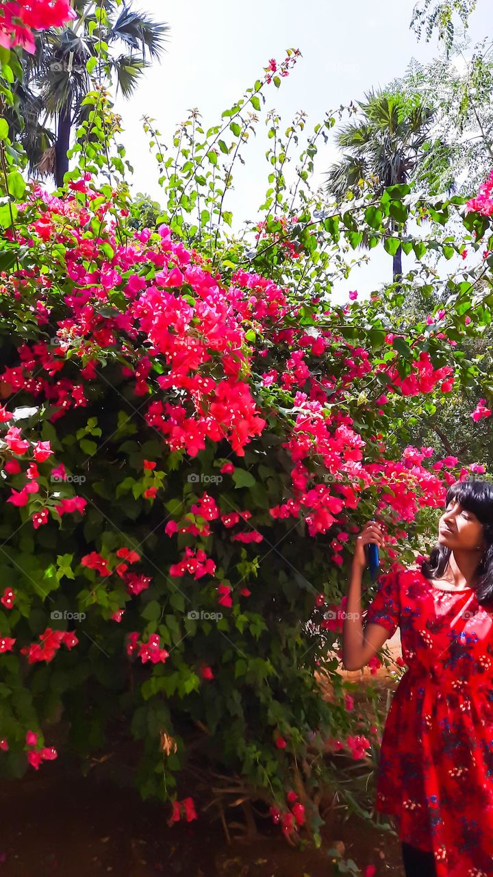 A girl near the flowers