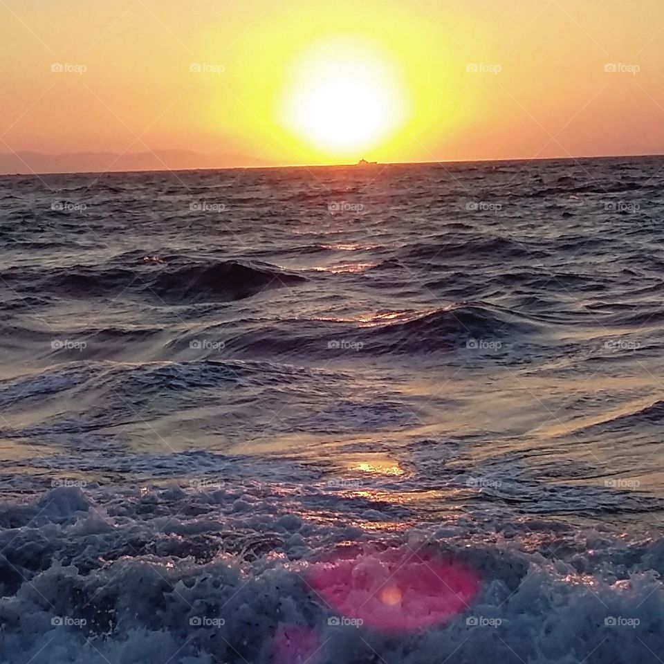 beautiful sunset with waves