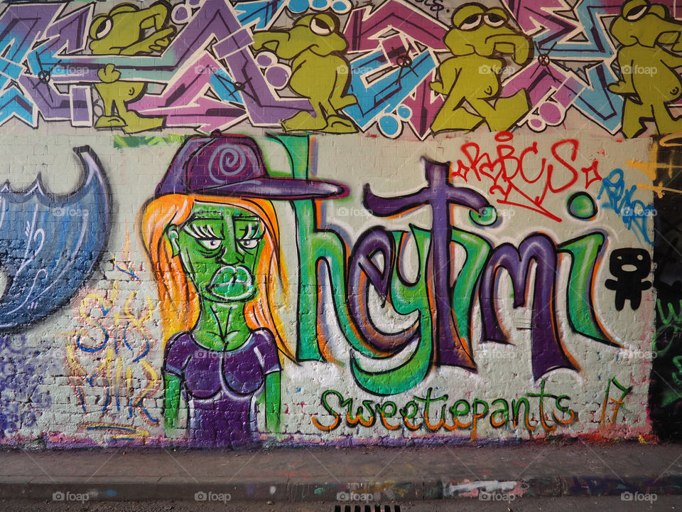 Graffiti with witch decor for Halloween from the Leake street tunnel in London.