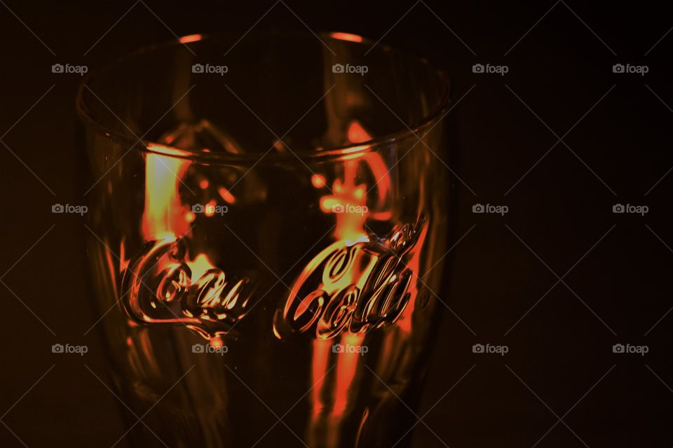 Coke Glass and fire reflex / copo de coca-cola e reflexo de fogo