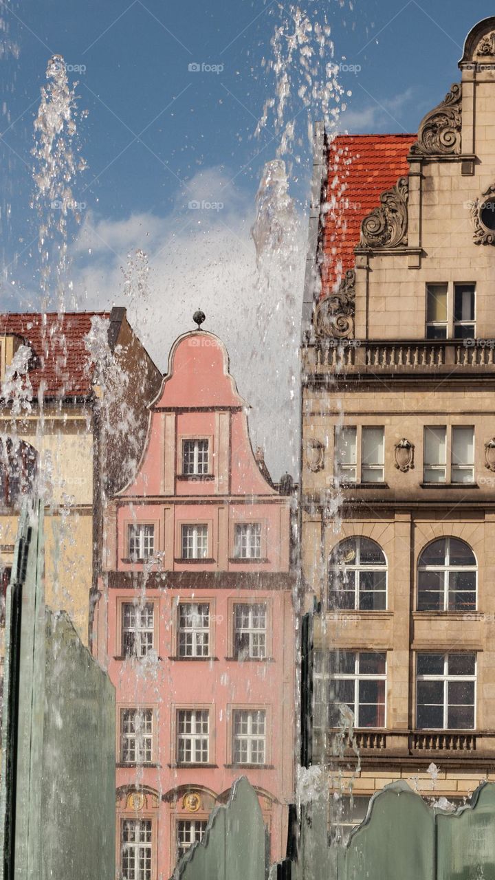 tenement houses and a fountain on the Wroclaw market square