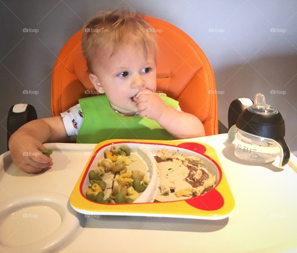 Baby eating solid food