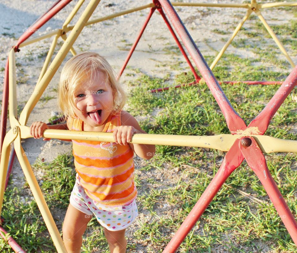 Girl playing in playground