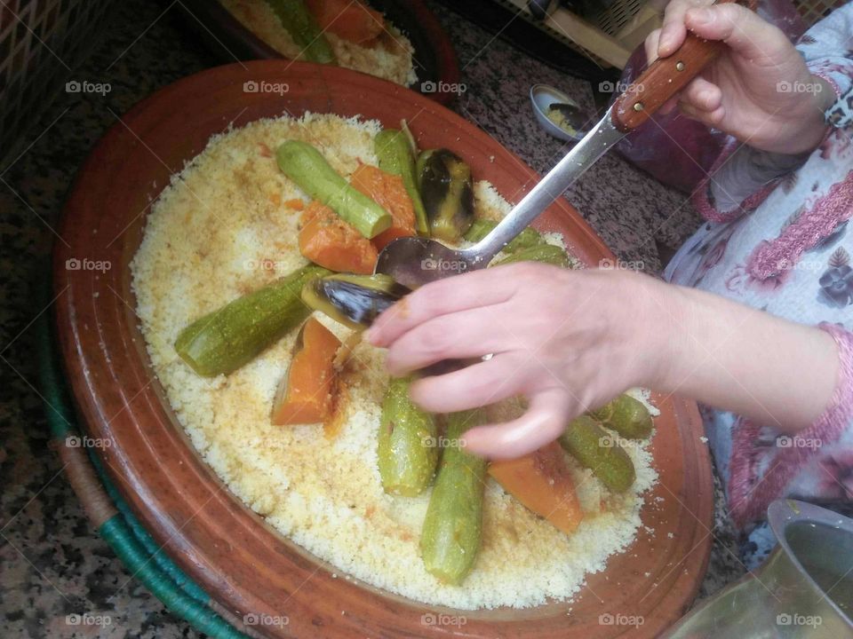 Delicious and famous food in Morocco:   COUSCOUS