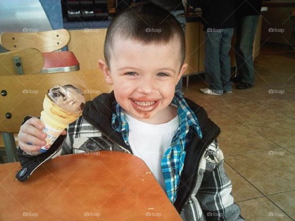 Boy eating ice cream 