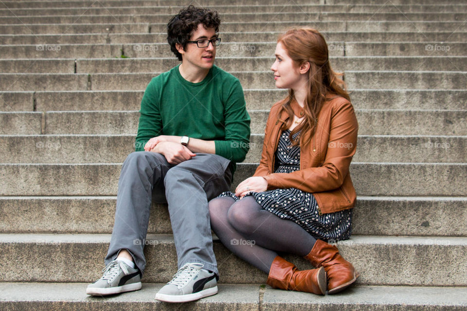 Couple sitting on steps 