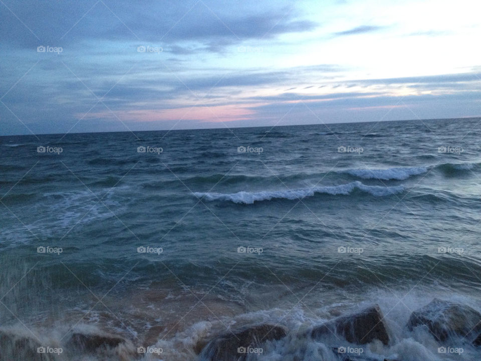 beach sunset rocks waves by kelsiespindola