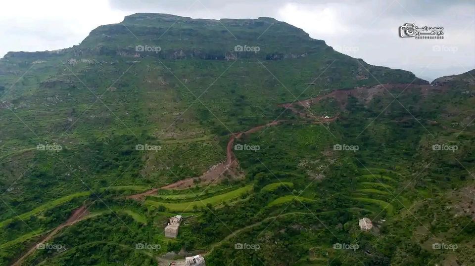 Glory be to God, the magnificent and picturesque view and the natural green trees are a view that is nothing more wonderful than it