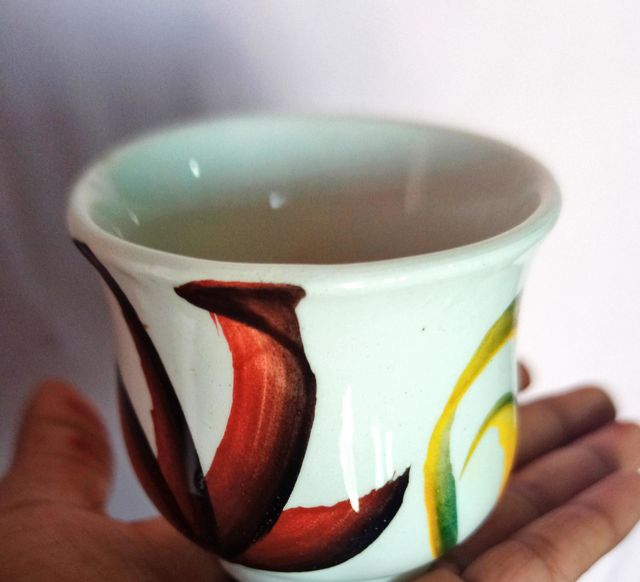 cup in hand