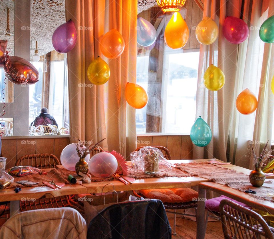 Decorated corner table with ballons.