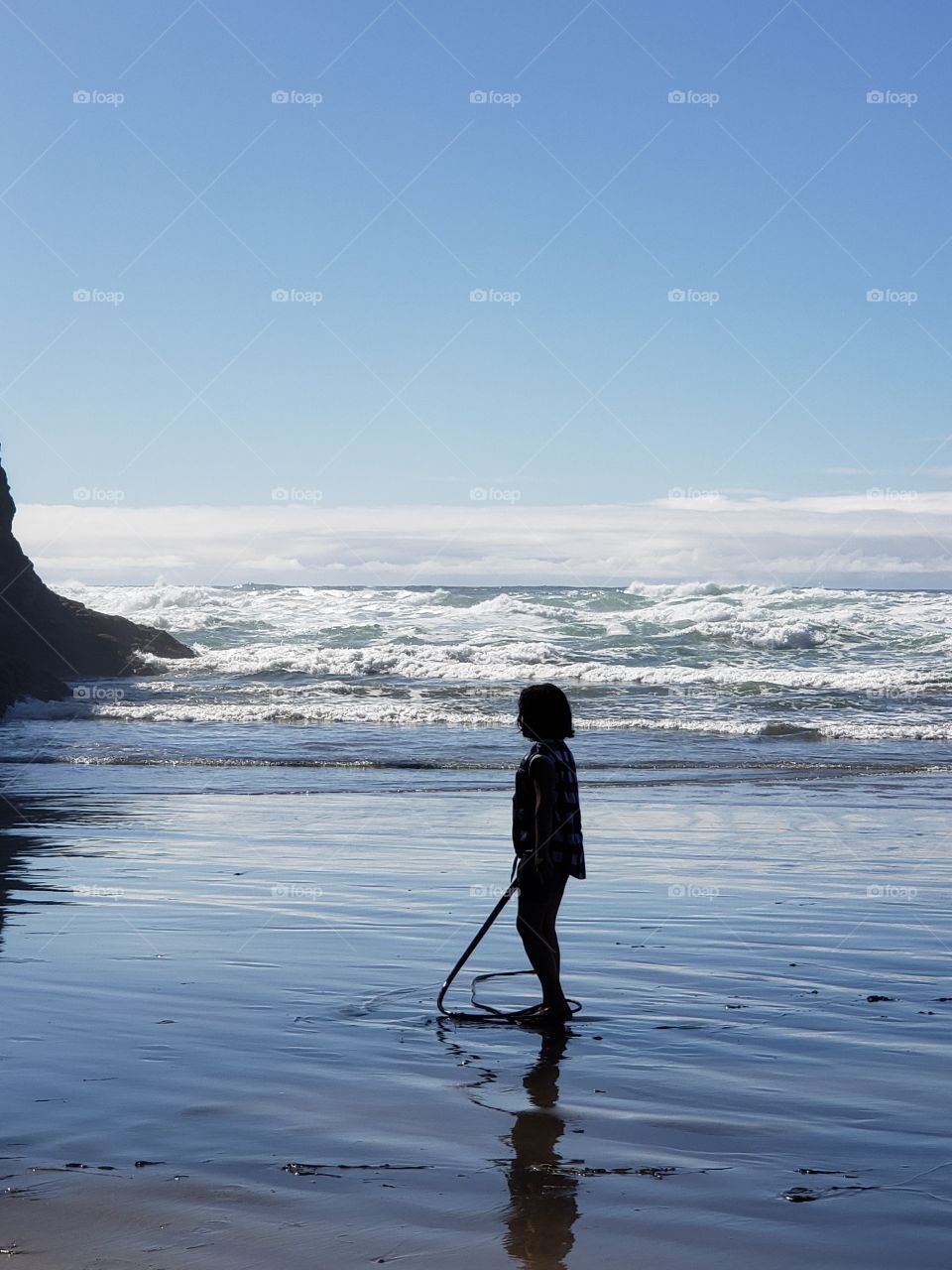 silhouette girl on the beach