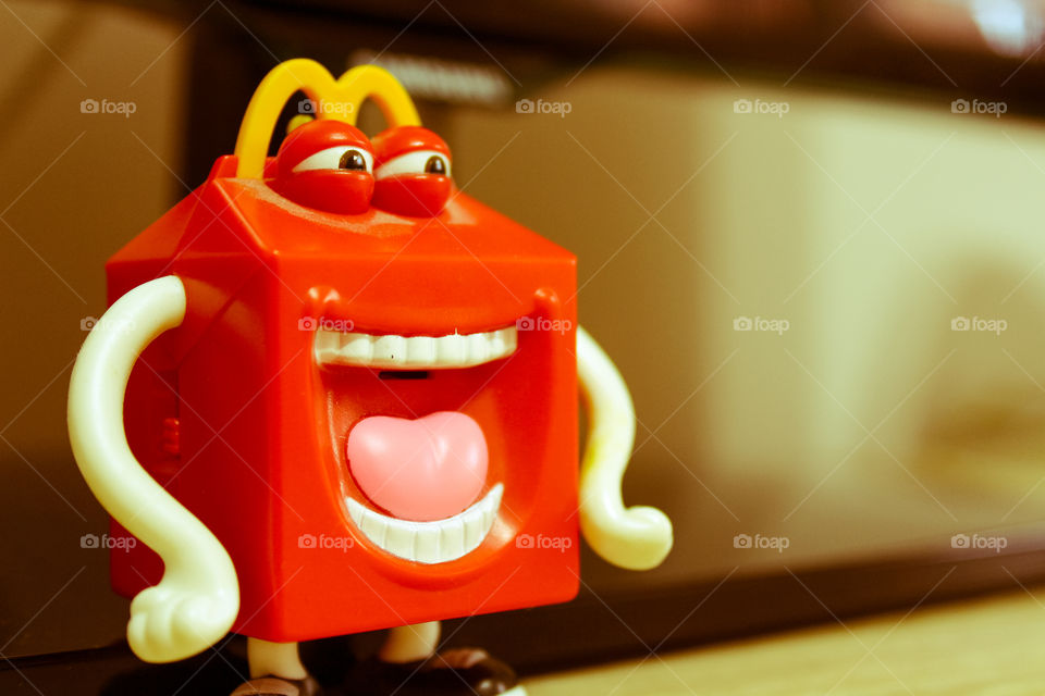 McDonald's toy mascot laughing in focus