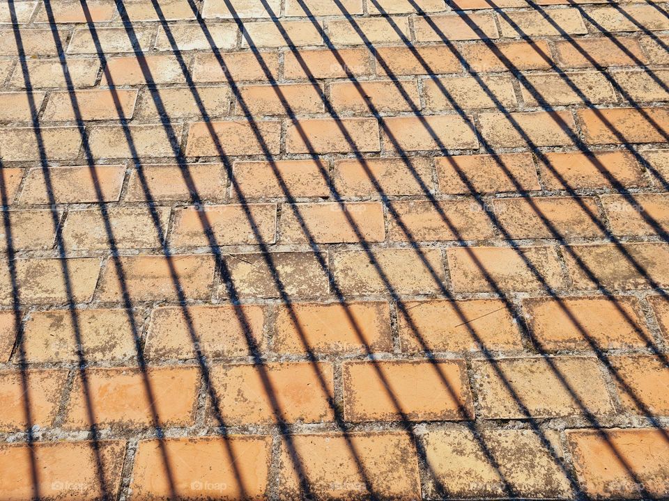 linear shadows of a railing
