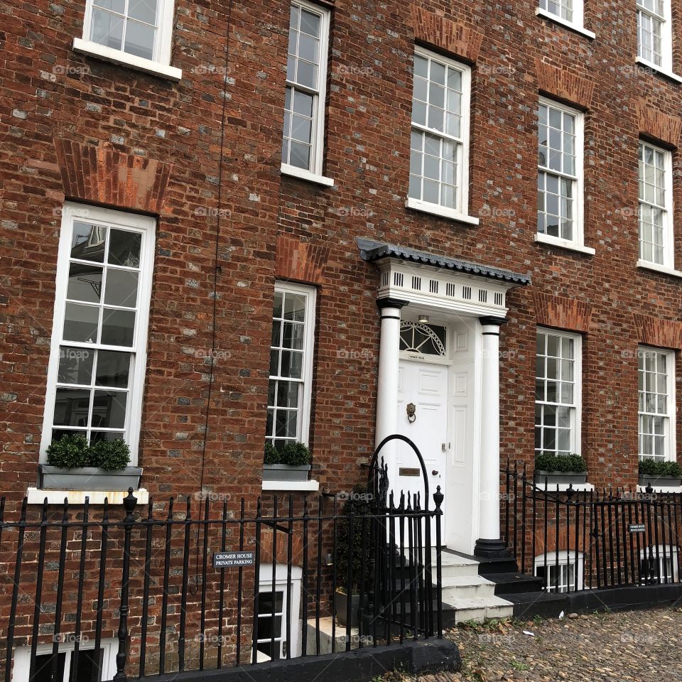 I rather fell in love with this rather impressive red and white bricked building l found in a small village in Devon.