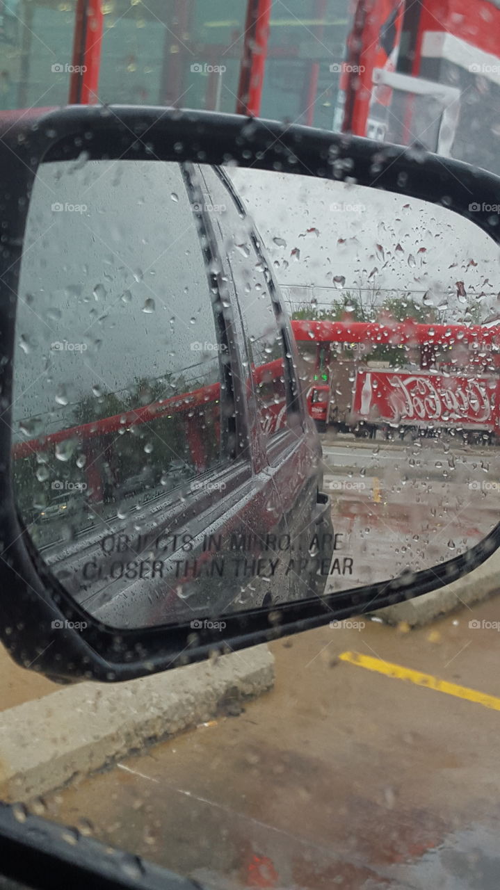 coke truck in the rain