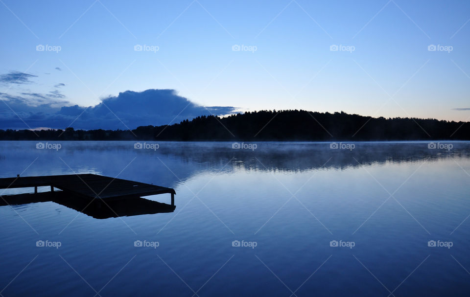 silhouettes on the lake