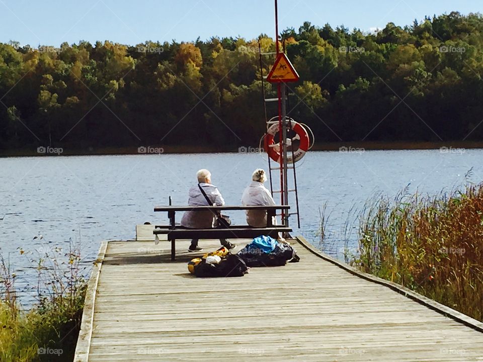 Elderly women by the lake