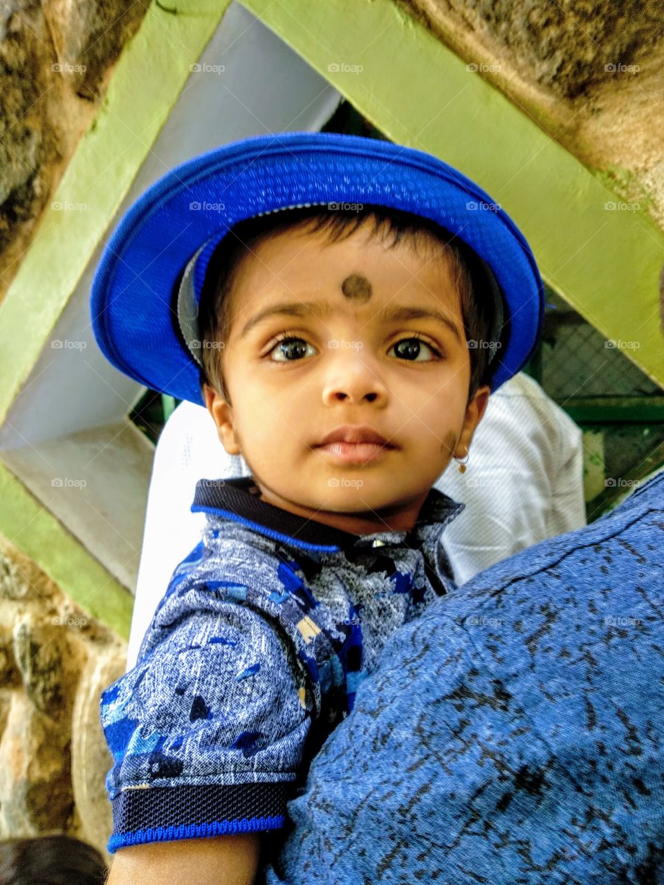 This child really awesome...just see his look... really I love it.he with her father,at the time of traveling I captured his photo. I love it.