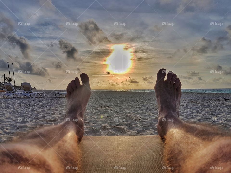 resting in the beach at sunrise