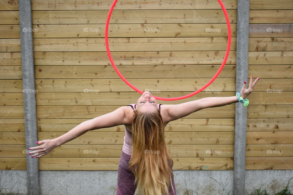 Woman dancing with a hulahoop