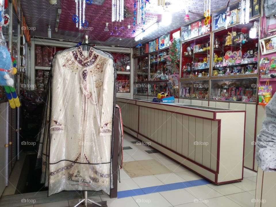 Sherwani in shop for sale