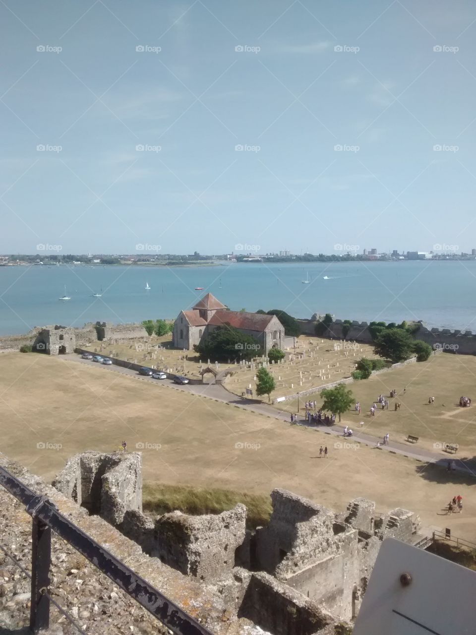 view from the keep at portchester caslte towards Portsmouth .