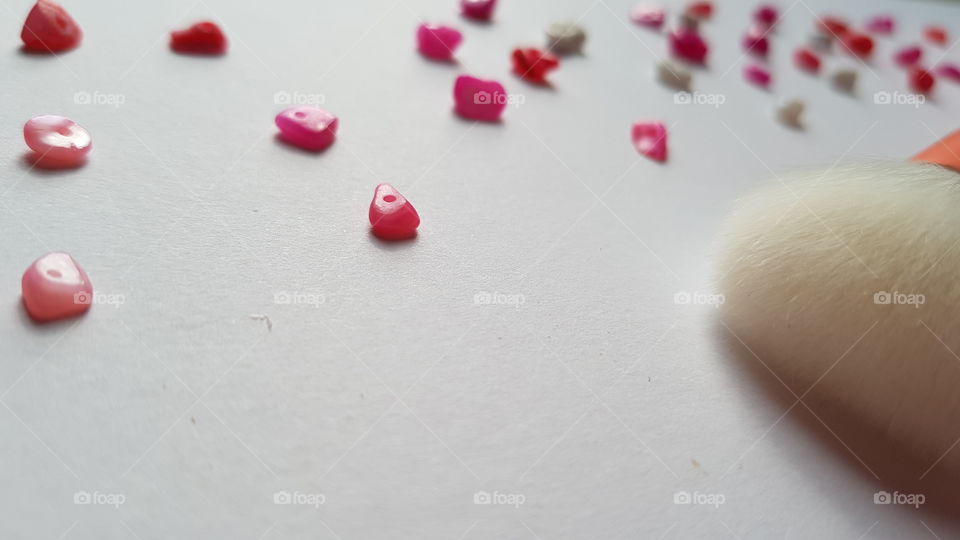 viewing some scattered pink marble stones by close angle..