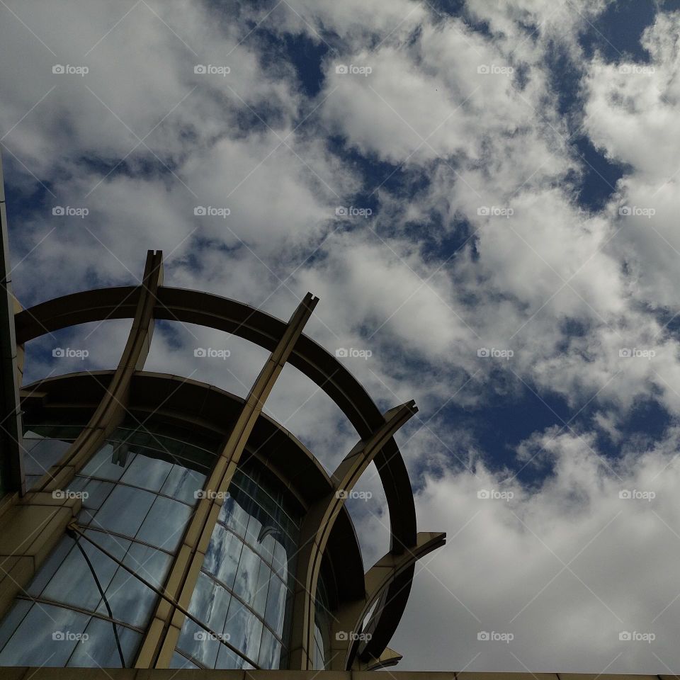 view of the building and the blue sky, seen from below