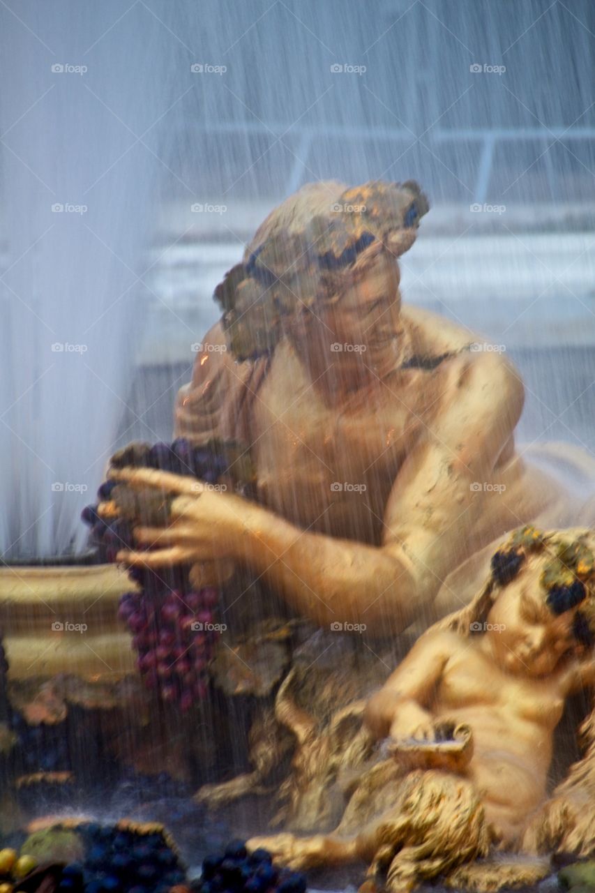 statue of a person in a garden